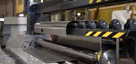 cnc plate bender|Automated Plate Roll – Sheet Metal Bender for Truck Production.